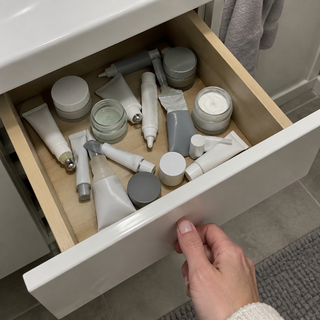 Drawer full of half-used eye creams