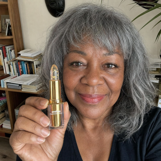 Woman holding Areliaa Signature Lipstick